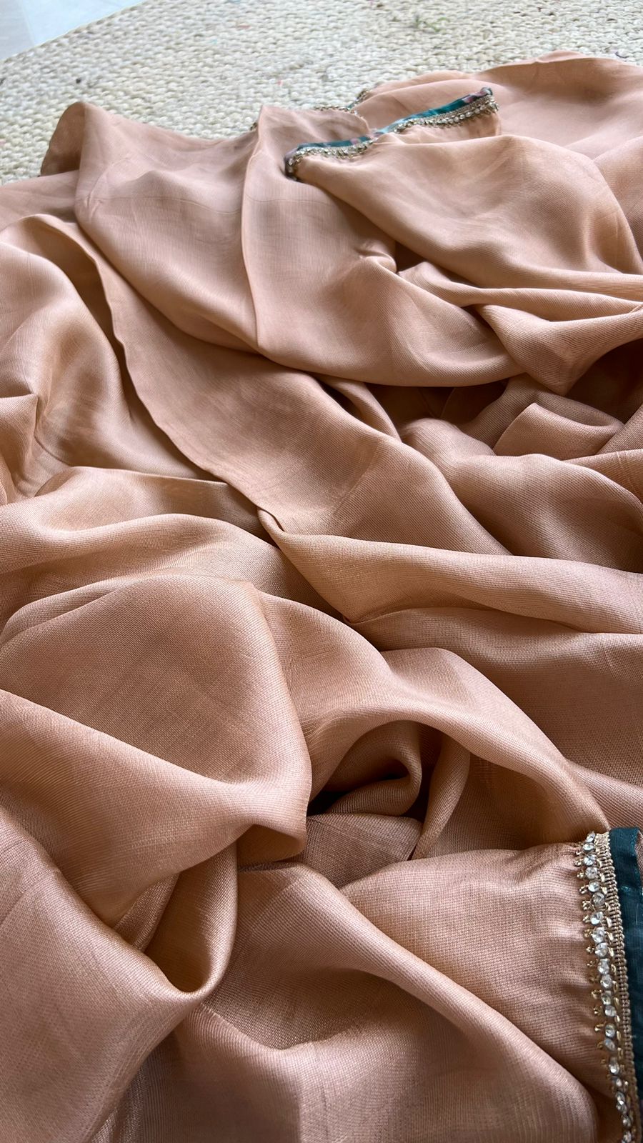 Jute copper saree with floral pearl handwork blouse