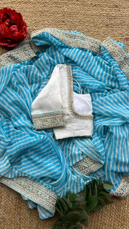 Aqua blue georgette saree with white handwork blouse