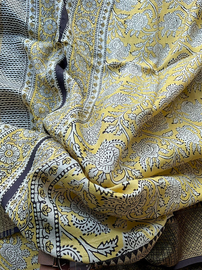 Yellow chanderi saree with black banarasi blouse