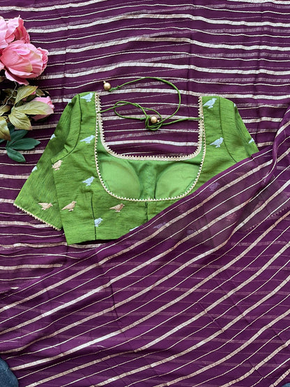 Purple chiffon saree with green hand worked blouse