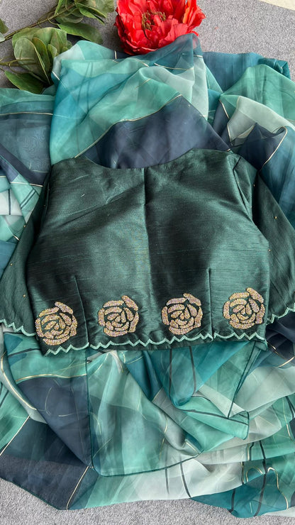 Soft green organza saree with handwork blouse