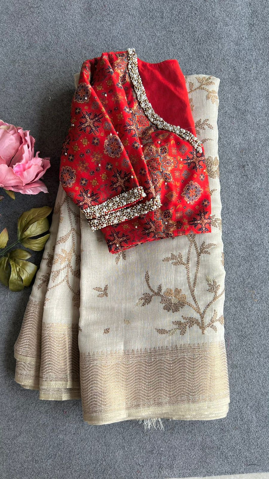 Cream chanderi saree with red handwork blouse