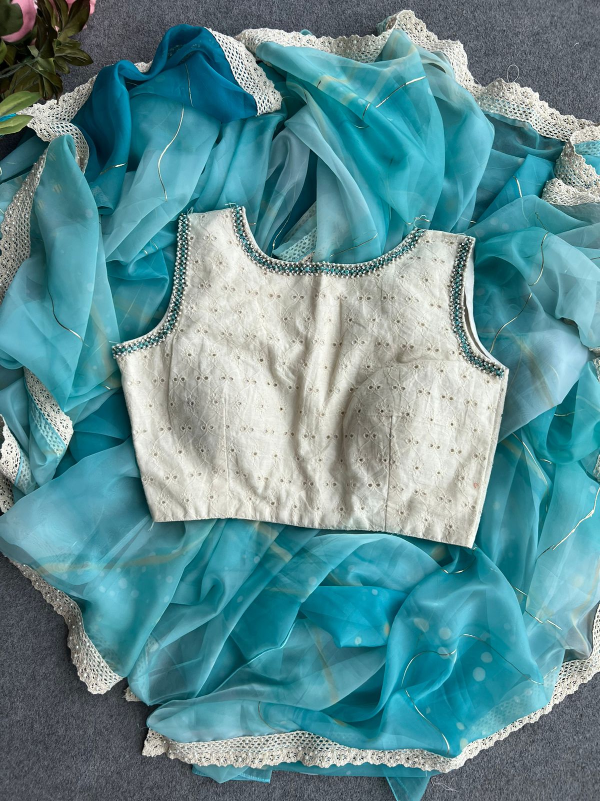 Aqua blue soft organza saree with crochet border ( only saree )
