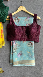 Blue organza saree with wine sequins blouse