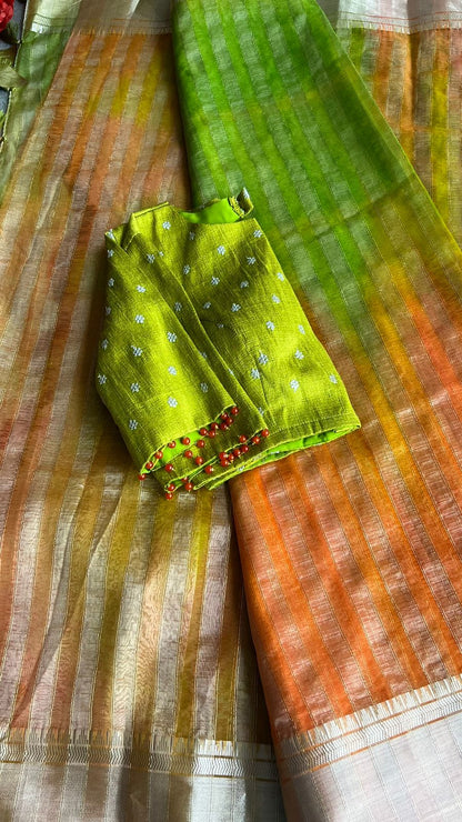 Multi tissue silk saree with green embroidery blouse