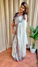 Silver silk saree with purple hand work blouse