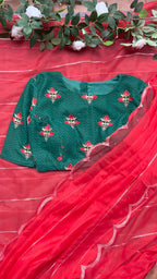 Reddish organza saree with green velvet blouse