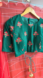 Reddish organza saree with green velvet blouse