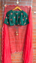 Reddish organza saree with green velvet blouse