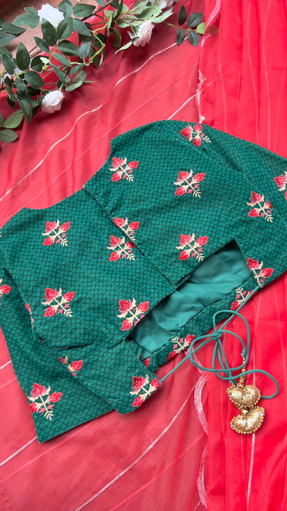 Reddish organza saree with green velvet blouse