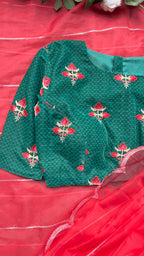 Reddish organza saree with green velvet blouse