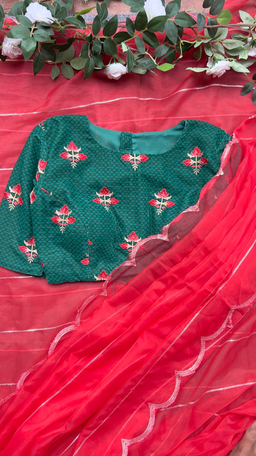 Reddish organza saree with green velvet blouse
