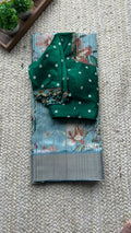 Blue floral tussar silk saree with hand work blouse
