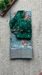 Blue floral tussar silk saree with hand work blouse