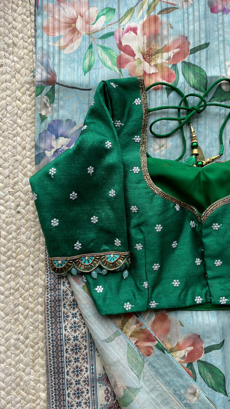 Blue floral tussar silk saree with hand work blouse