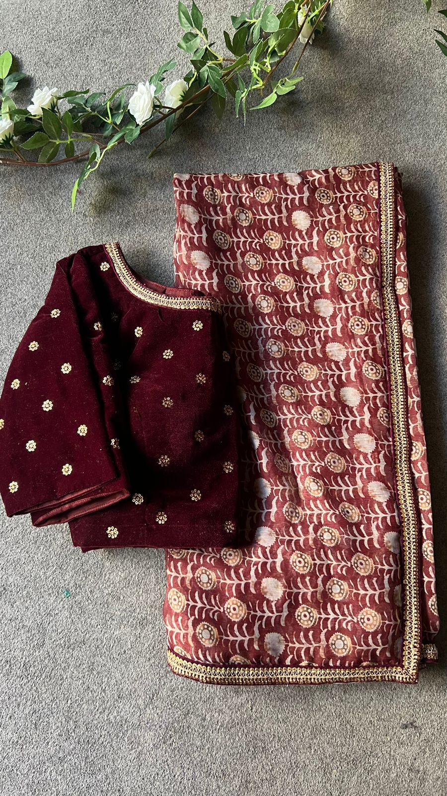 Maroon georgette saree with velvet hand work blouse