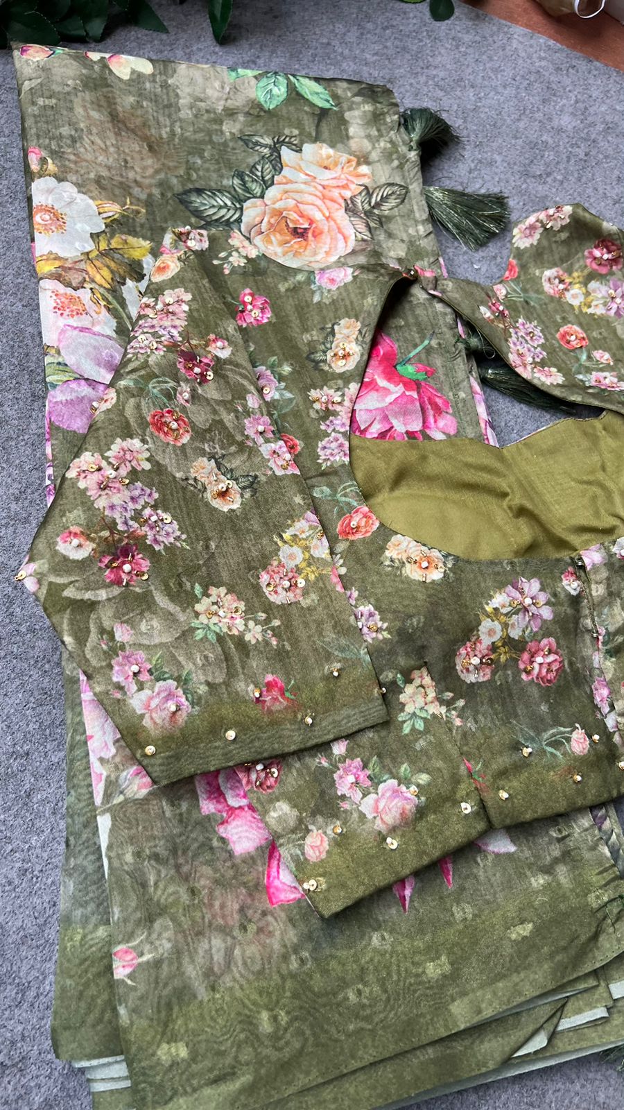 Green floral organza saree with handwork blouse