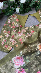 Green floral organza saree with handwork blouse
