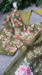 Green floral organza saree with handwork blouse