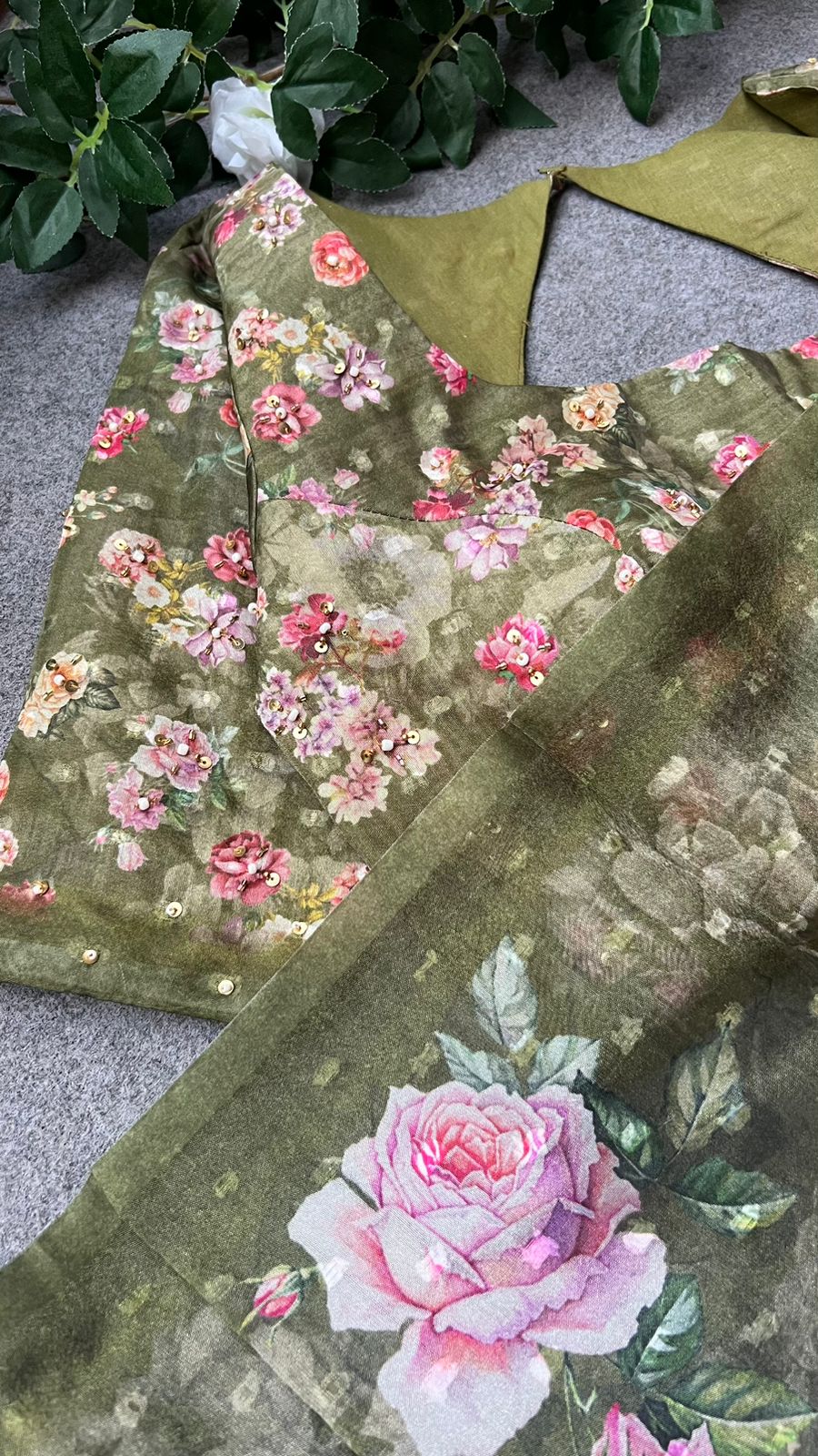 Green floral organza saree with handwork blouse