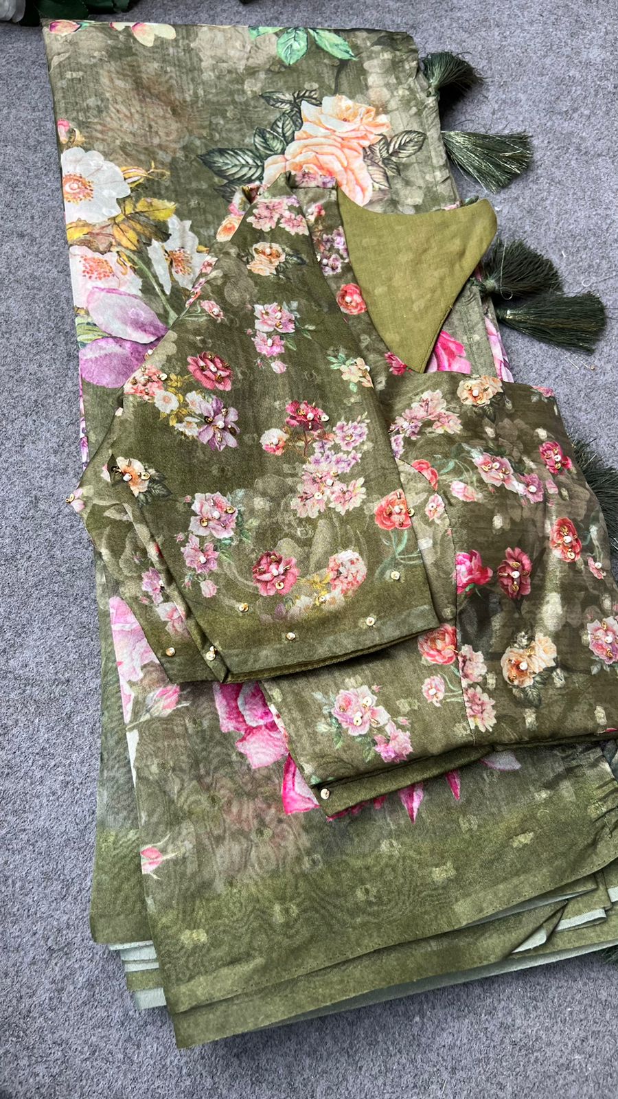Green floral organza saree with handwork blouse
