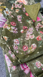 Green floral organza saree with handwork blouse
