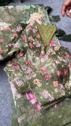 Green floral organza saree with handwork blouse