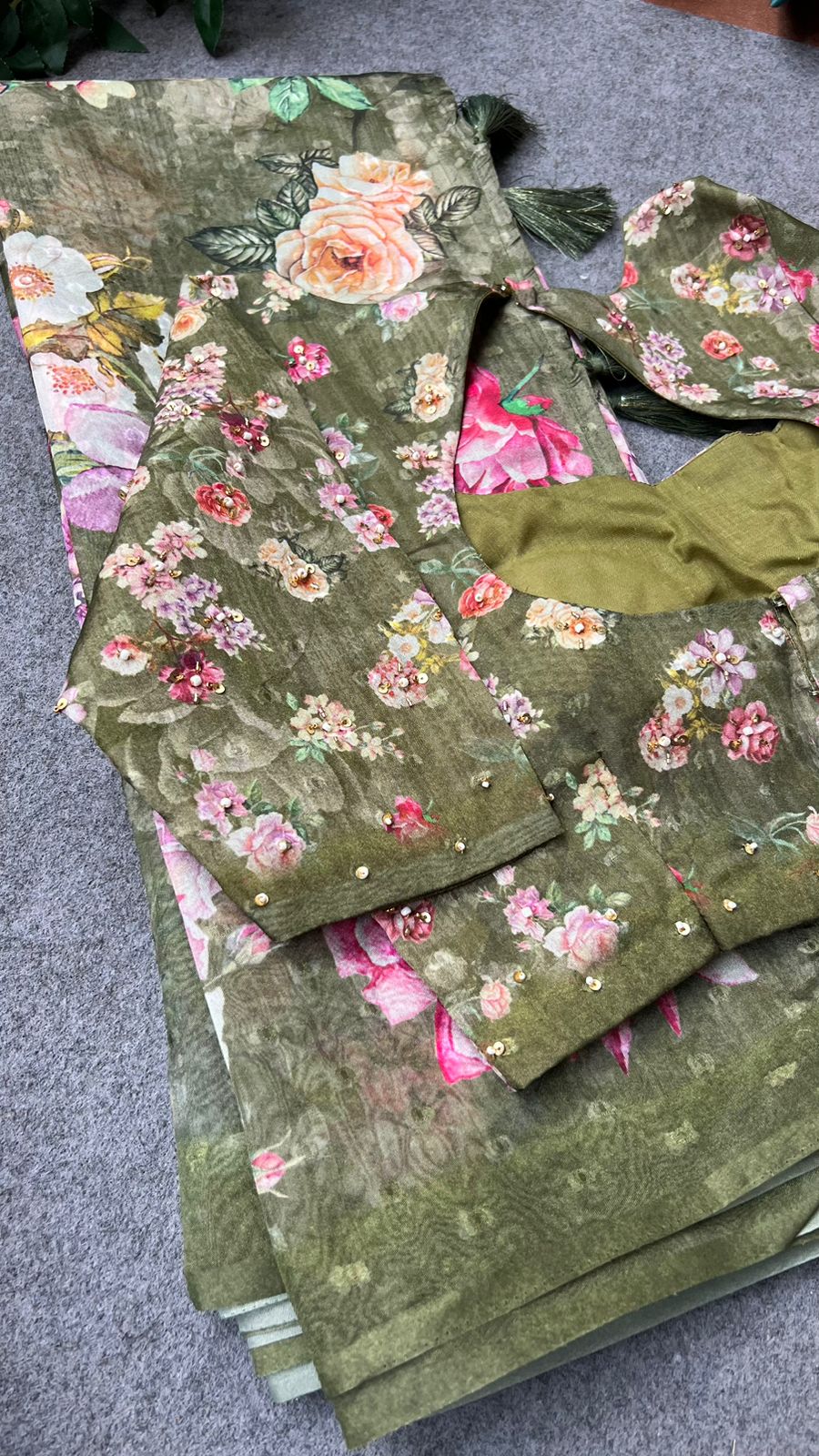 Green floral organza saree with handwork blouse
