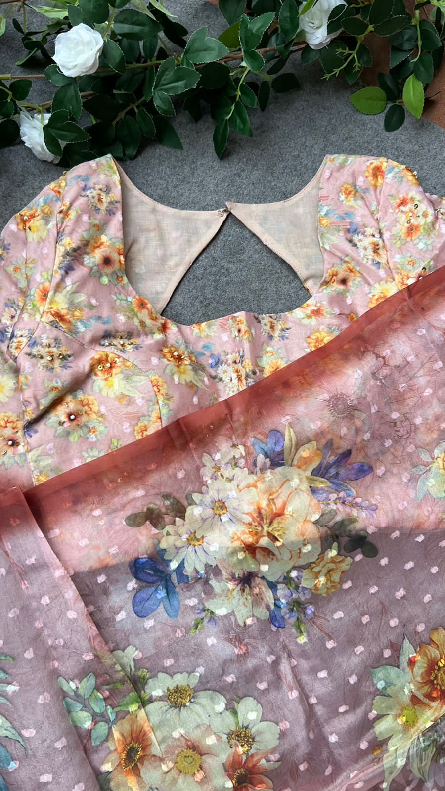 Peach floral organza saree with handwork blouse