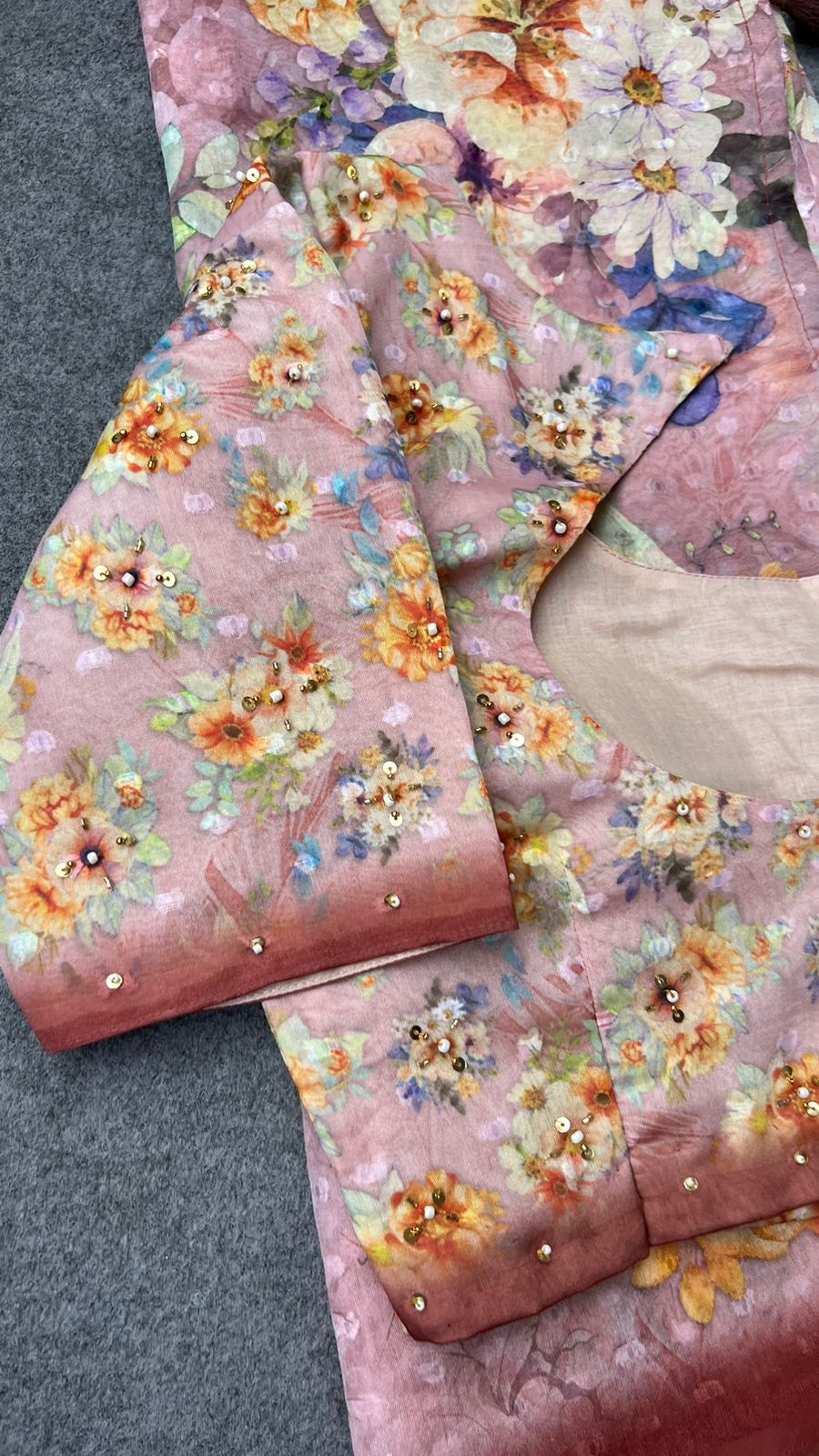 Peach floral organza saree with handwork blouse