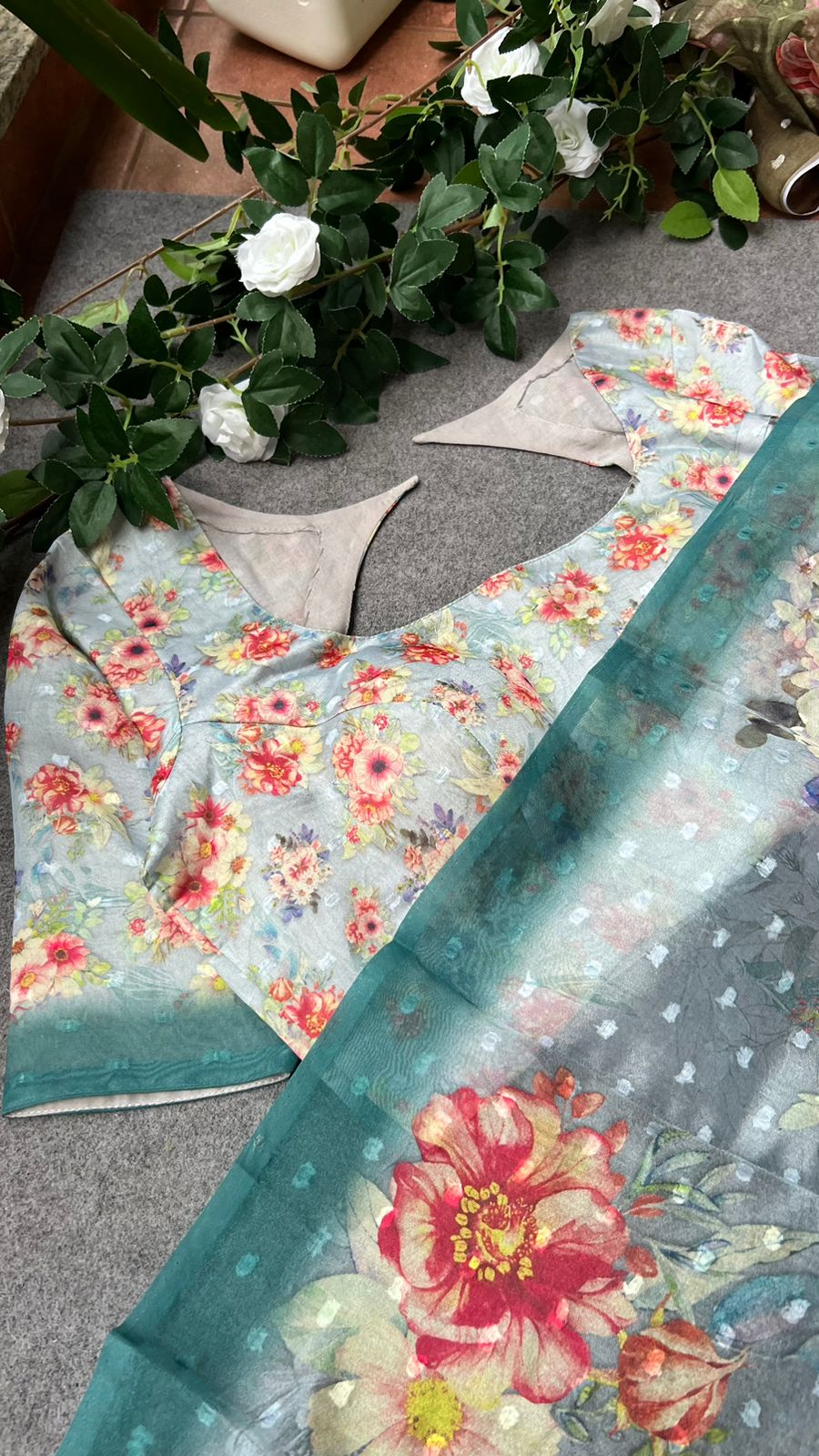 Blue floral organza saree with floral blouse