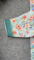 Blue floral organza saree with floral blouse