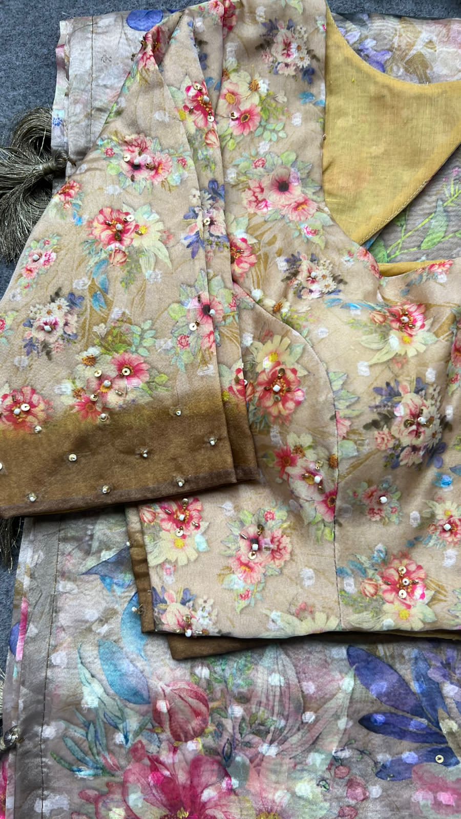 Cream & brown floral organza saree with handwork blouse