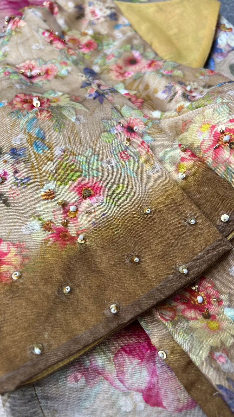 Cream & brown floral organza saree with handwork blouse