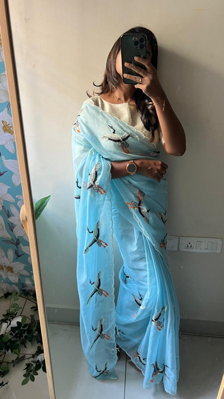 SKy blue organza swan embroidery saree with blouse