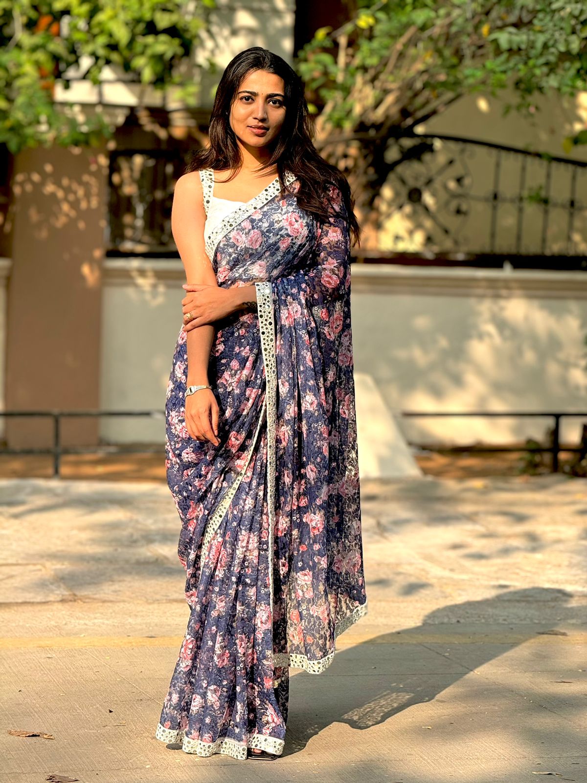 Netted floral designer saree with hand worked blouse