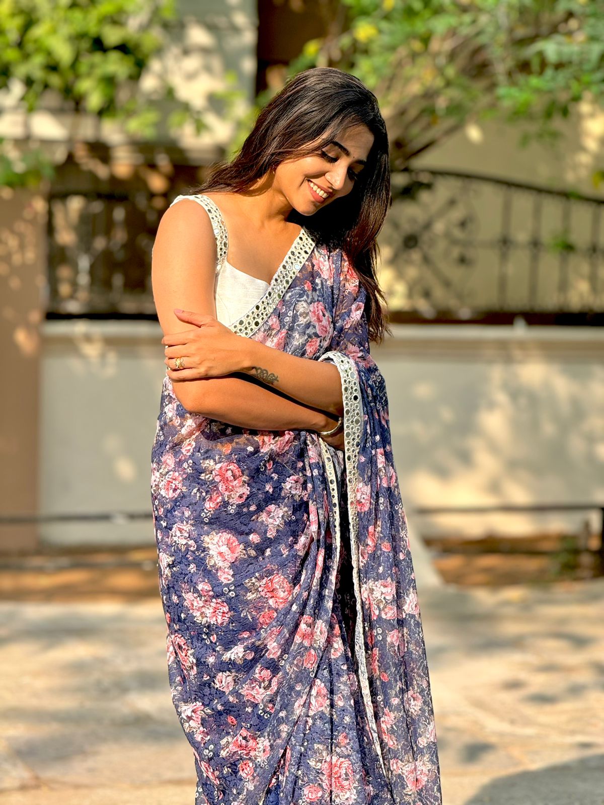 Netted floral designer saree with hand worked blouse
