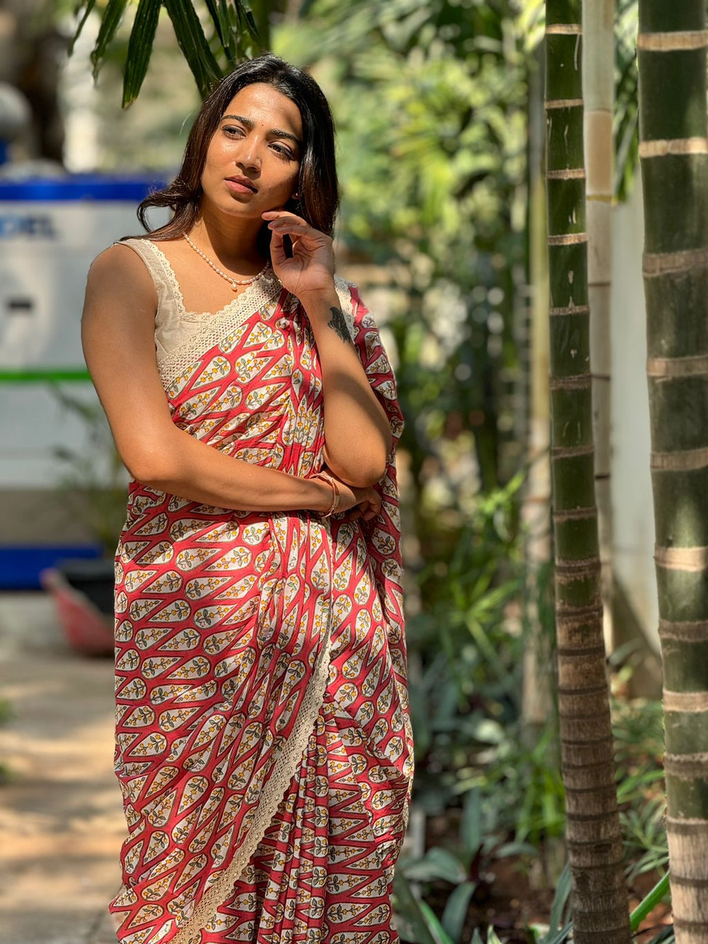 Pink cotton saree with half white embroidery blouse