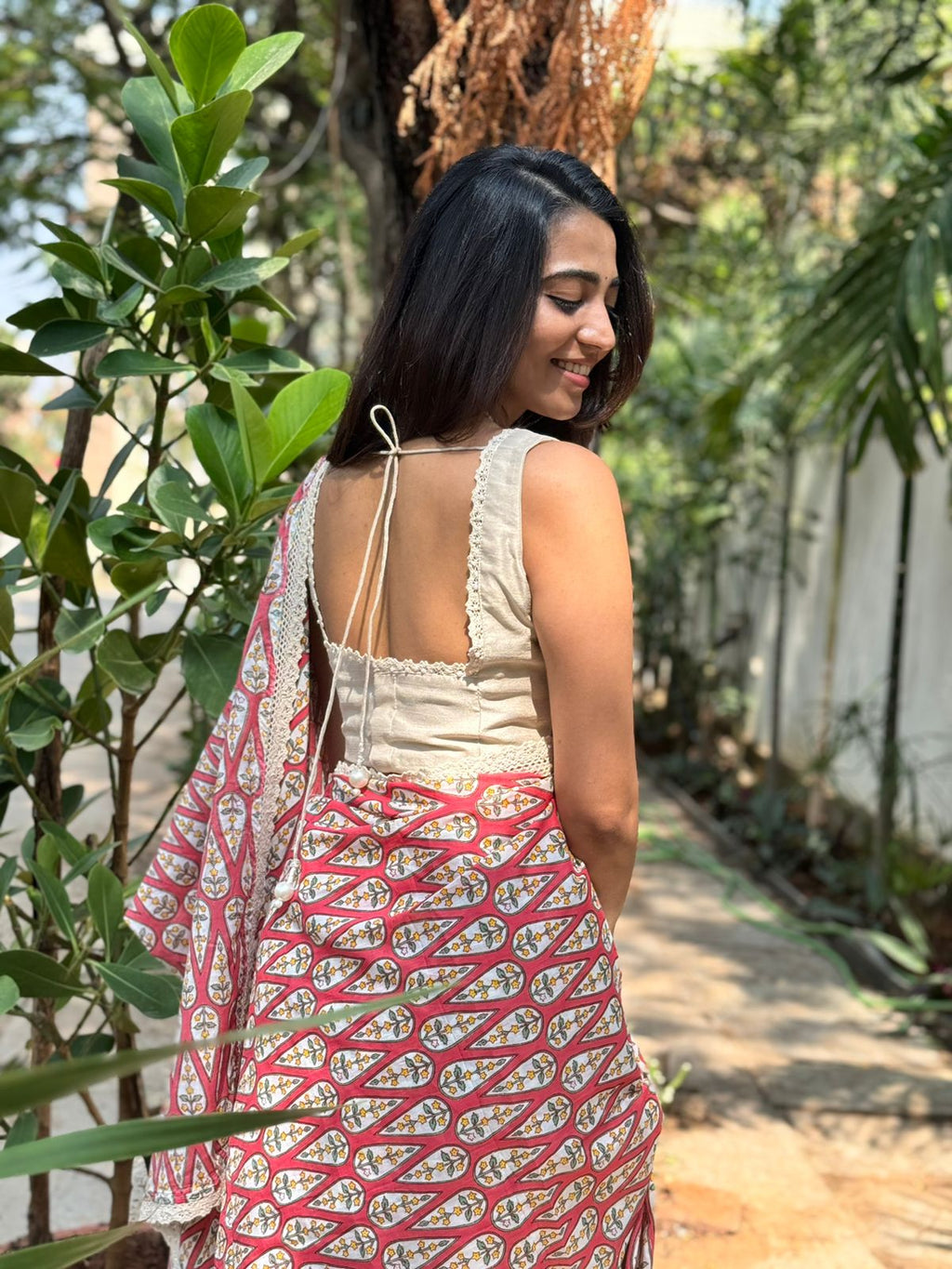 Pink cotton saree with half white embroidery blouse