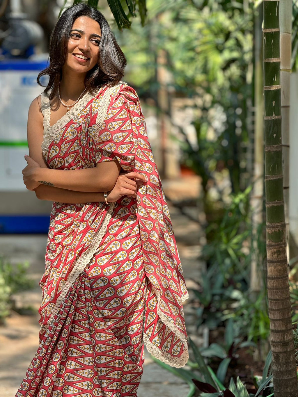 Pink cotton saree with half white embroidery blouse