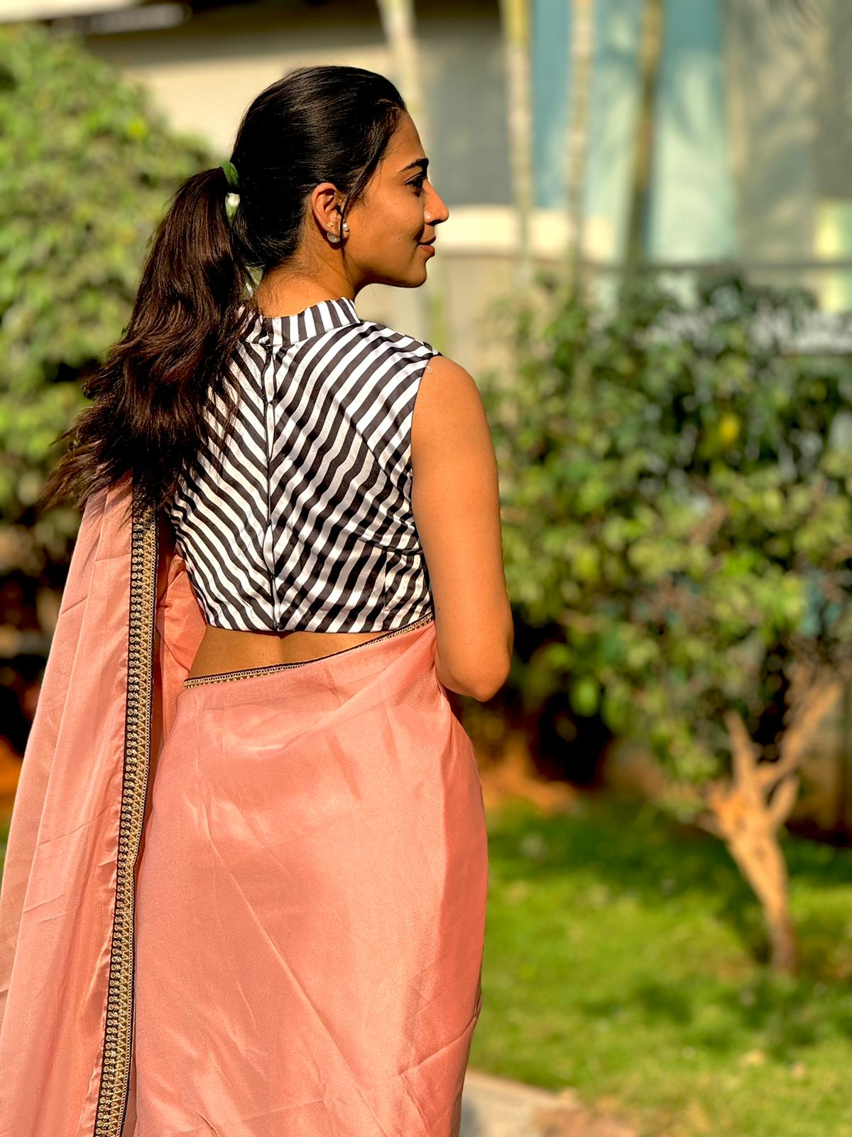 Peach organza saree with satin blouse