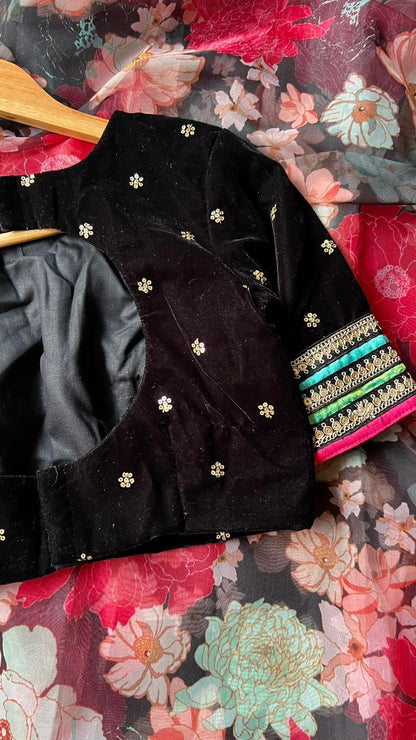 Black floral organza saree with velvet embroidery blouse