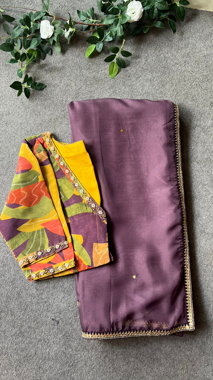 Purple organza saree with silk hand work blouse