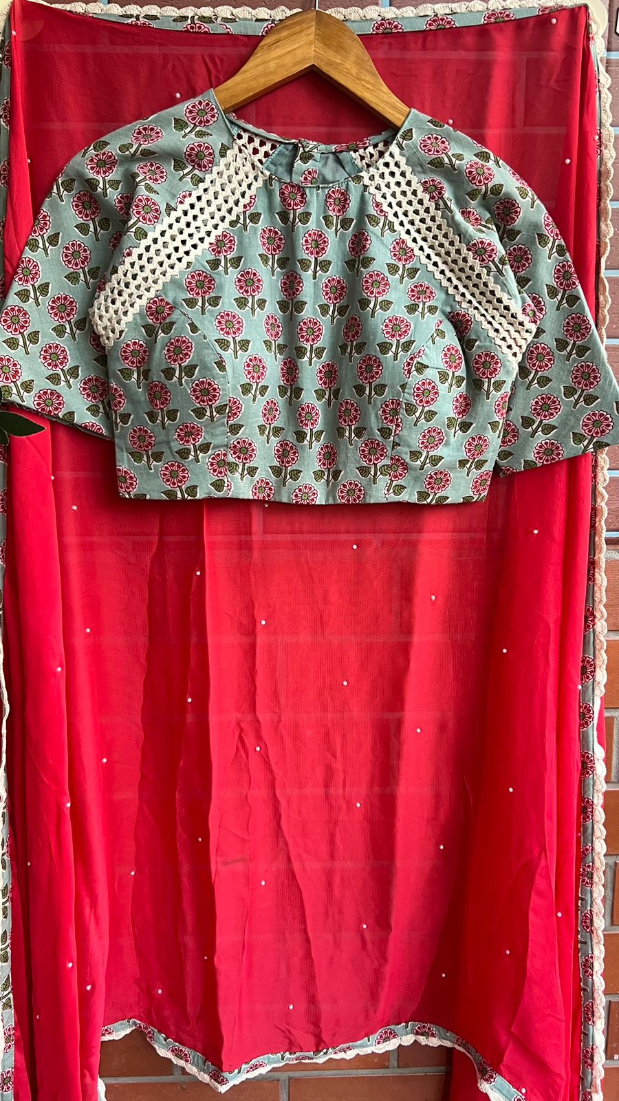 Reddish maroon jute saree with cotton hand block printed blouse