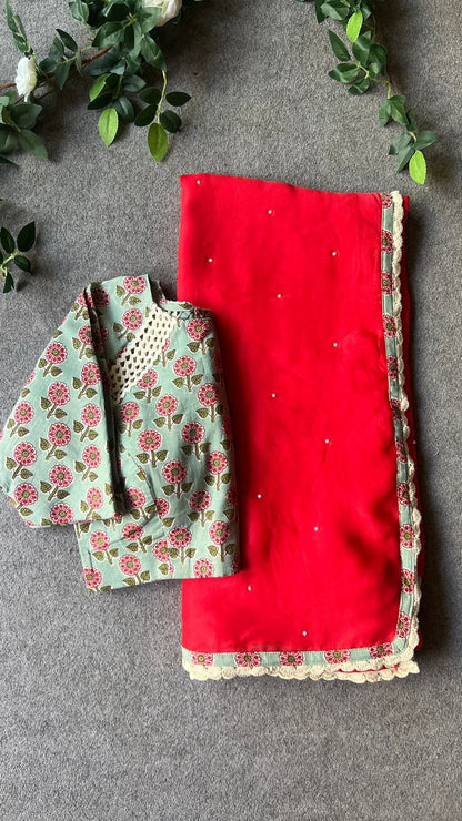 Reddish maroon jute saree with cotton hand block printed blouse