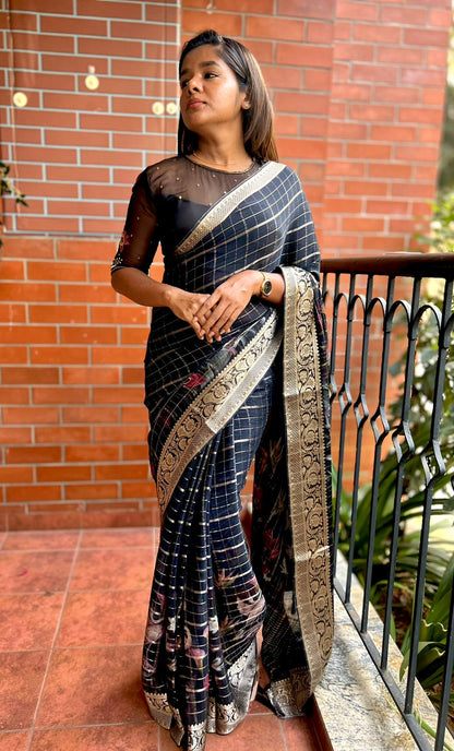 Black floral organza saree with black hand worked blouse