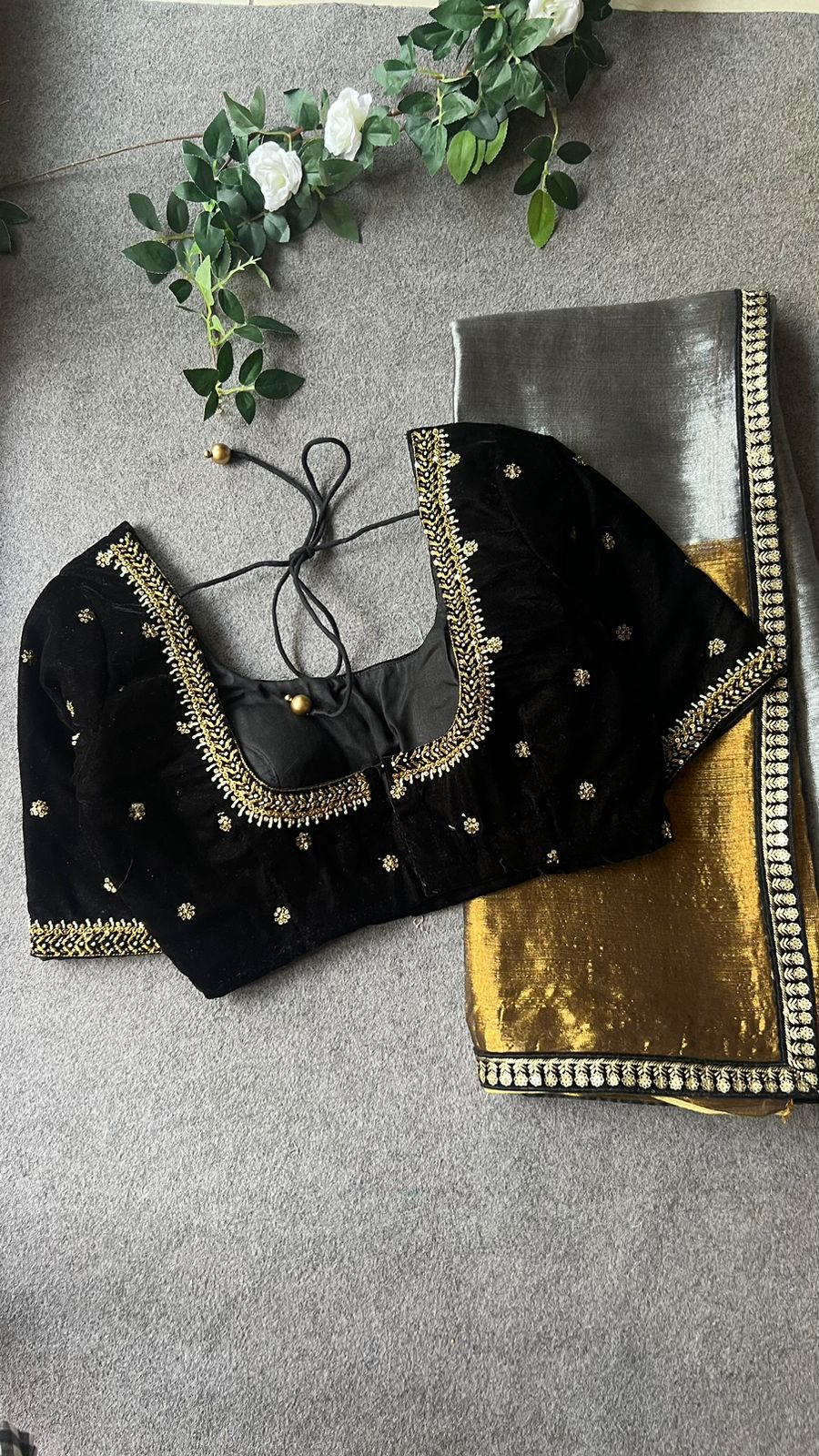 Silver tissue saree with black velvet hand worked blouse