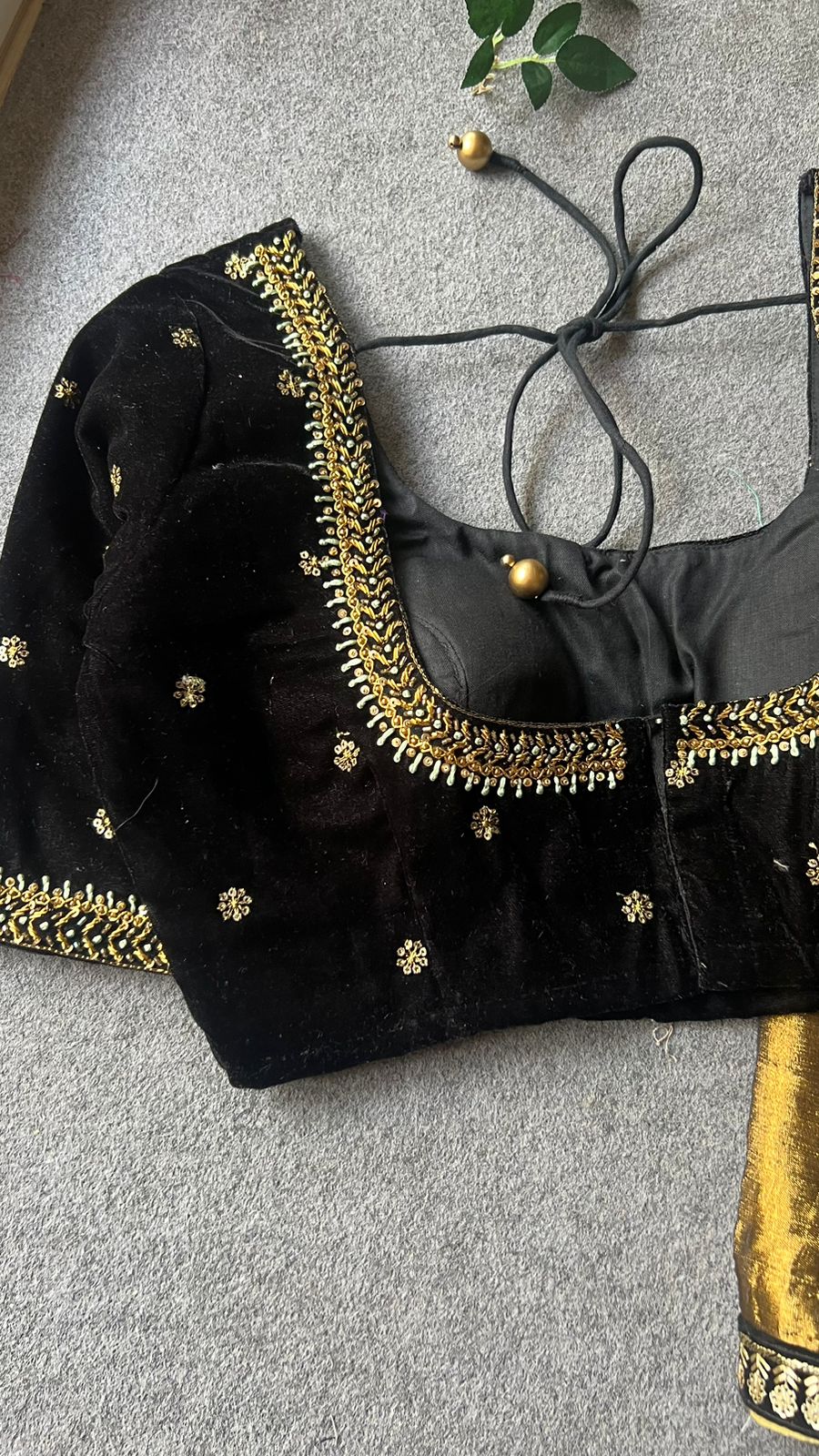 Silver tissue saree with black velvet hand worked blouse