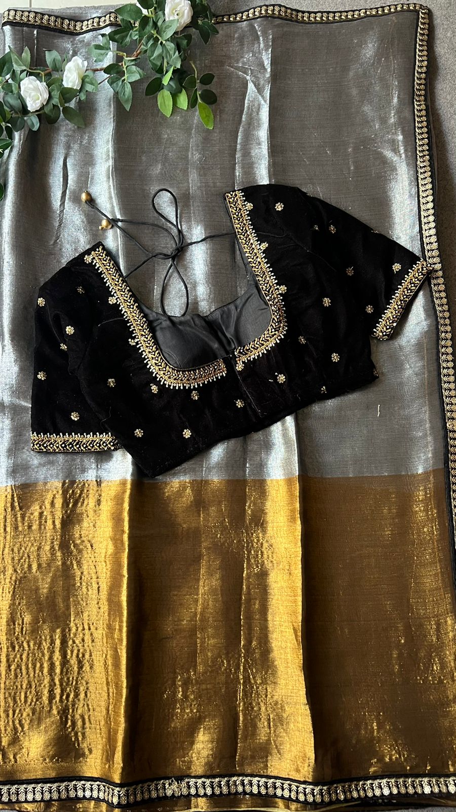 Silver tissue saree with black velvet hand worked blouse