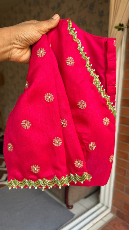 Light grey georgette saree with pink hand worked blouse